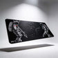 Large mouse pad with astronaut design on a gray background